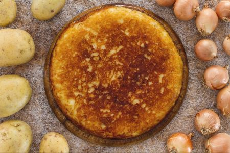 Frico met aardappelen en uien