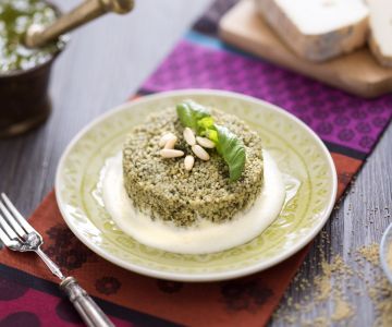 Couscousovenschotel met pestosaus en taleggiosaus