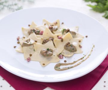 Ravioli met cotechino en linzensaus