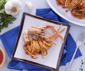 Linguine met scampi en cognac