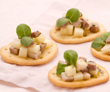 Platbroodjes met porchetta en provolone