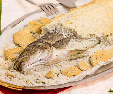 Zeebaars in zoutkorst met kruiden en bier