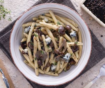 Strozzapreti met champignons en gorgonzola