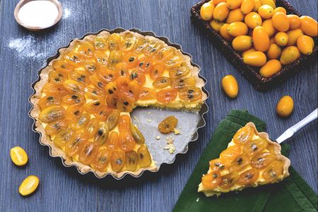 Taart met gekarameliseerde kumquats