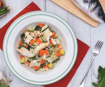 Risotto met groentesaus en gesauteerde zeebaars met salie