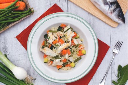 Risotto met groentesaus en gesauteerde zeebaars met salie