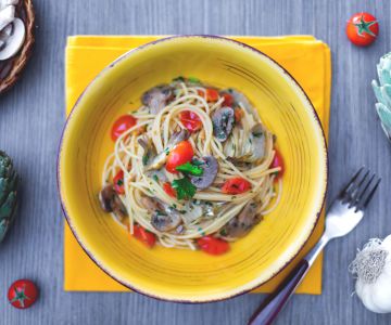 Spaghetti met champignons, artisjokken en cherrytomaatjes