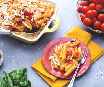 Ovengebakken penne met tomaat en gezouten ricotta