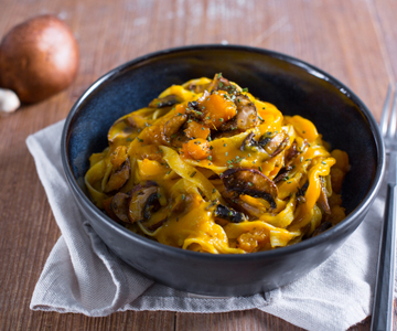 Pasta met pompoen en champignons