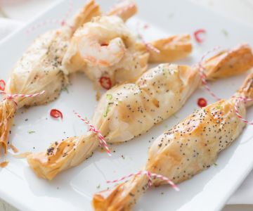 Kerstpakketjes met scampi, gember en limoen