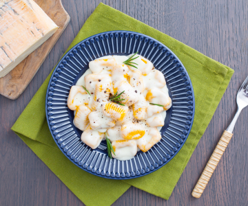Pompoen-gnocchi met taleggio-saus
