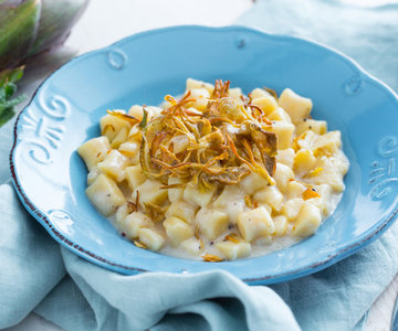 Gnocchi cacio e pepe met krokante artisjokken