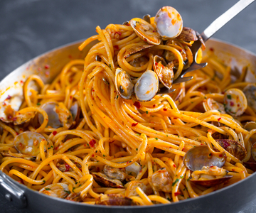 Spaghetti met venusschelpen en nduja