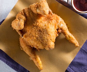 Gefrituurde jonge haan