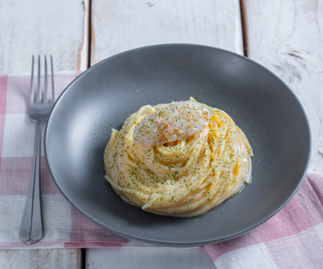 Spaghetti met geroosterde citroen en scampi