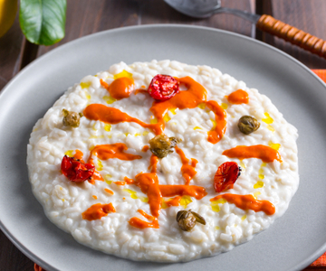 Risotto met burrata, kappertjes en cherrytomaatjes