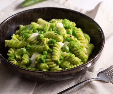 Romige pasta met doperwten
