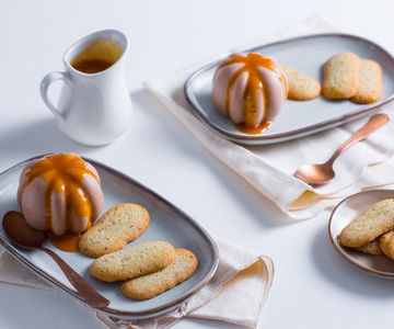 Gianduja-pudding met sinaasappelsaus