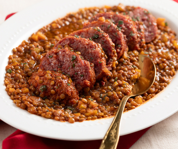 Cotechino met linzen in tomatensaus