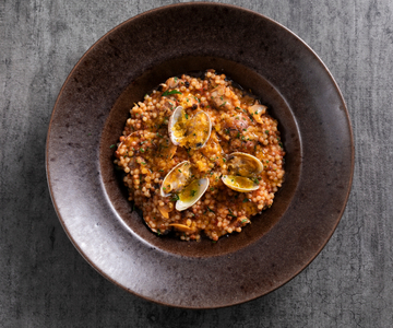 Fregola met venusschelpen en bottarga