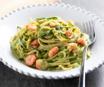 Romige pasta met courgette en garnalen