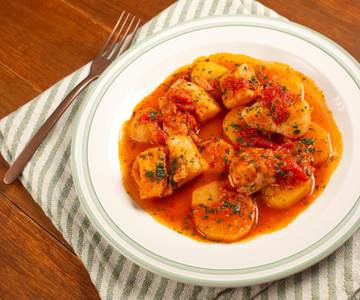 Gezouten kabeljauw gestoofd met aardappelen