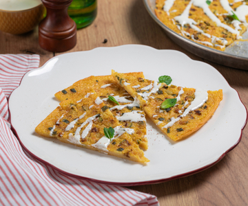 Farinata met courgette en pecorinofondue