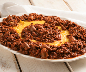 Polenta met bruscitt in tomatensaus