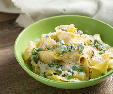 Pasta met room en doperwten