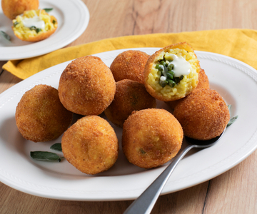 Arancini met sperziebonen