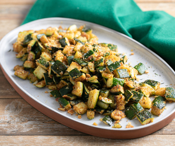 Gegratineerde courgettes uit de koekenpan