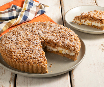 Kruimeltaart zonder oven met ricottacrème en perziken