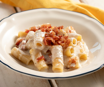 Pasta met Parmezaanse room en speck