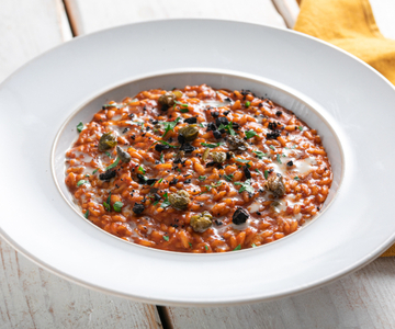 Risotto alla puttanesca met geroosterde tomaten